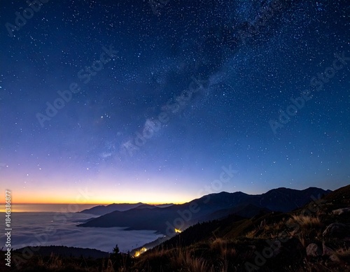 Wallpaper Mural Beautiful starry night sky over a tranquil ocean and distant mountains, evoking peace and wonder Torontodigital.ca