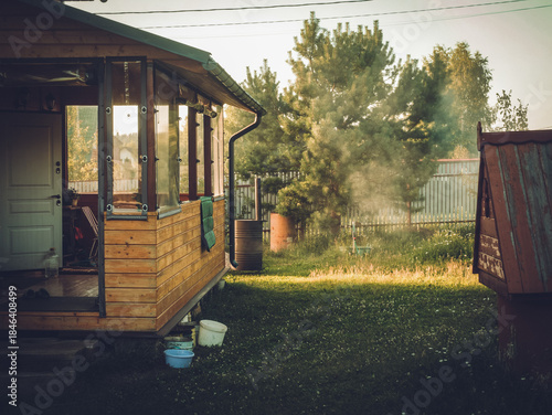 Garbage incinerator in the yard of a rural house