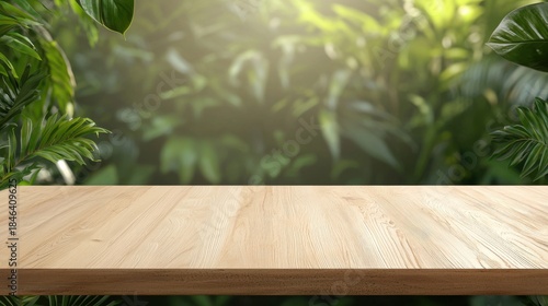 Bright wooden table surface with tropical green leaves and blurred jungle forest background, providing a natural product display space for organic themes