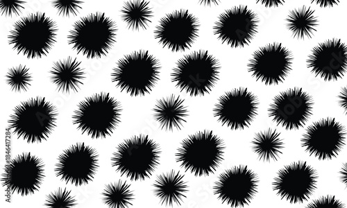 A collection of black spiky circular shapes on a white background