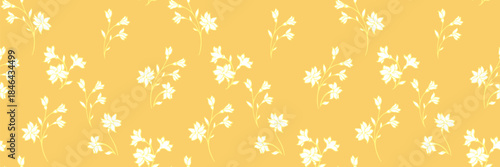 Seamless vector floral pattern with soft white blossoms and slender stems on a warm yellow background, creating a bright and elegant botanical design perfect for textiles and modern decor