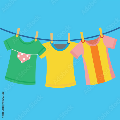 Three colorful t-shirts hanging on a clothesline in a flat design illustration