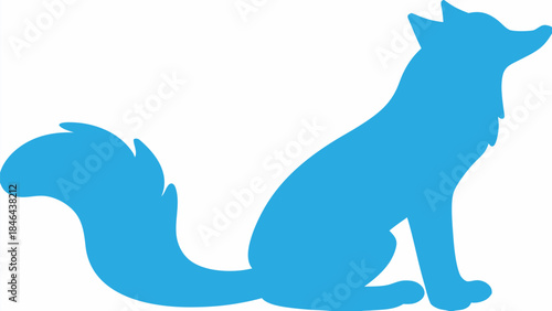 Vibrant blue fox silhouette looking up with bushy tail