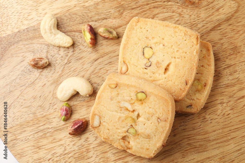 Fototapeta premium baked butter cookies with garnished dry fruits