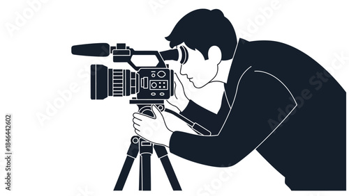 Cameraman filming with professional video camera on tripod, capturing a moment