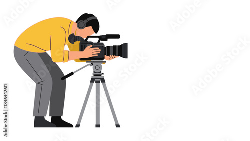 Filmmaker operating a professional video camera on a tripod, capturing footage