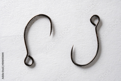 Two Barbless Fishing Hooks on White Background