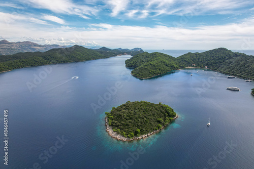 Aerial view of emerald islands nestled in the sapphire embrace of the Adriatic Sea, a tapestry of nature's finest hues, Sipanska Luka, Dubrovnik-Neretva County, Croatia.