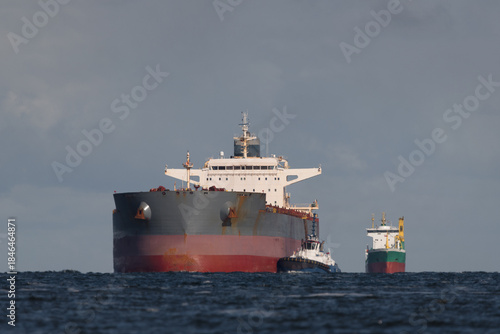 MARITIME TRANSPORT - A large bulk carrier is sailing into sea port