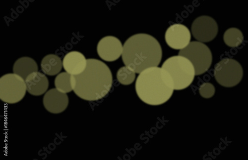 Soft Olive Green and Khaki Bokeh Circles Floating on a Dark Background