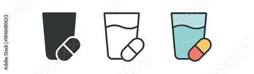 morning routine water glass and vitamin pill