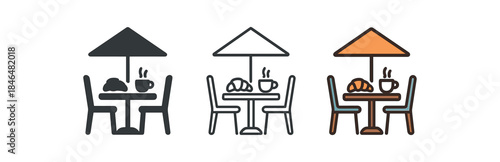 calm neighborhood cafe table with croissant and coffee