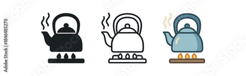 seasonal lifestyle winter kettle on stove with gentle steam