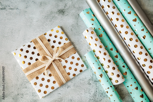 Wallpaper Mural Minimal top view of assorted wrapping papers and presents. Ideal for creative packaging, seasonal celebrations or romantic gift ideas Torontodigital.ca