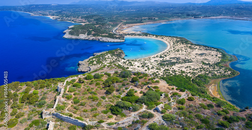 Fototapeta Naklejka Na Ścianę i Meble -  Panoramic aerial view of the landscape of south Peloponnese with the popular Voidokilia beach and the old castle ruins in front, Messenia, Greece