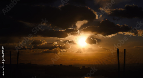 Cityscape at sunset. Beautiful clouds over the city.