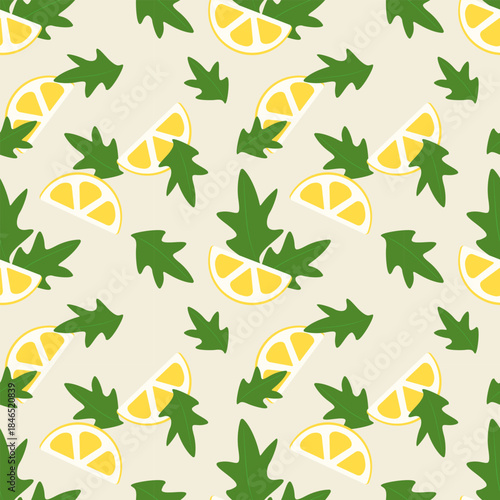 Arugula leaves and juicy lemon slices on beige background, healthy vegetarian pattern.