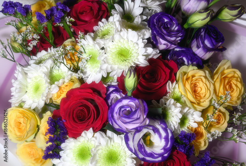 Vibrant floral bouquet with roses and chrysanthemum.