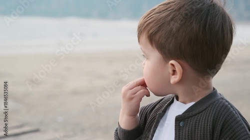 Portrait of a two year old child outdoors in summer
