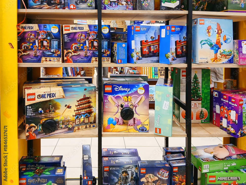 Obraz premium Poznan, Poland - 4 December 2025: Lego shelf with bricks boxes.