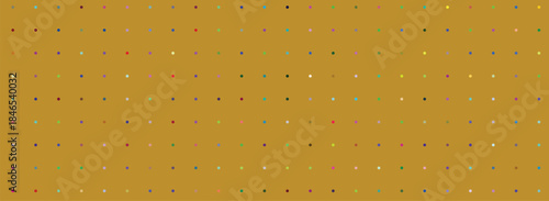 Abstract gold background texture featuring macro liquid bubbles and clean water drops on a wet glass surface with a yellow beer or champagne pattern