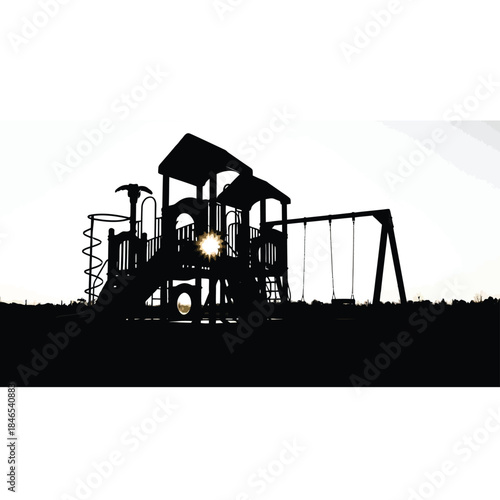 Silhouette of an oil rig at sunset