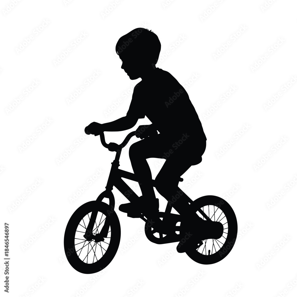 Obraz premium Silhouette of a child riding a bicycle