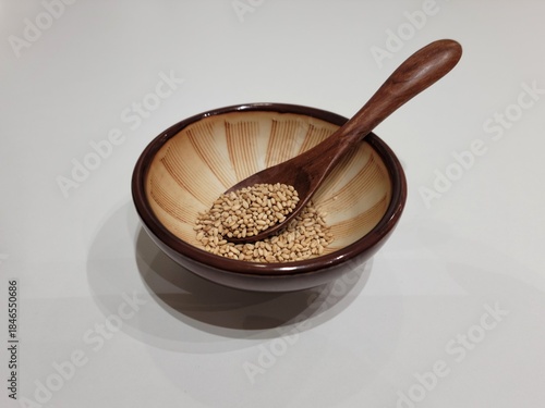 Sesame Seeds or Perilla Seeds in Traditional Korean Ceramic Bowl and Mortar