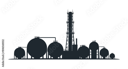 Industrial complex with large storage tanks and a distillation column a striking silhouette