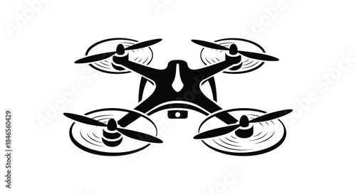 A striking black drone design with visible propellers captured as a dramatic silhouette