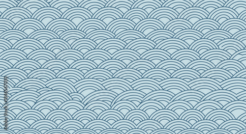 Seamless Japanese wave pattern in shades of blue representing water and the ocean for a traditional oriental background design.