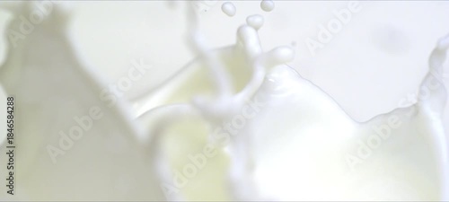 Wallpaper Mural Slow motion almonds falling into milk. Milky splash Torontodigital.ca