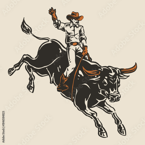 Cowboy riding a bull at rodeo