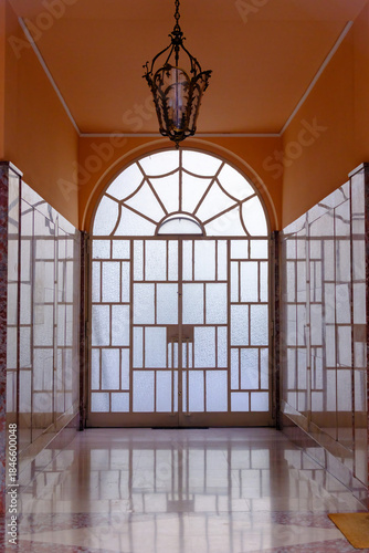 Entryway of an old residential building near Corso Sempione, Milan, Italy