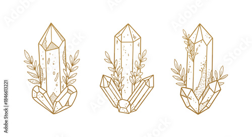 Set of three mystical illustrations featuring golden healing crystals surrounded by delicate leafy branches in a magical boho style.