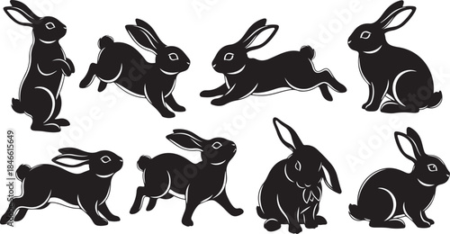 Black silhouettes of rabbits in various poses and movements