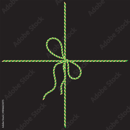 Green and gold String Rope with Crossed Bow Isolated on black background. symbolizing gift wrapping, holidays, celebration, and handmade packaging on black  background.