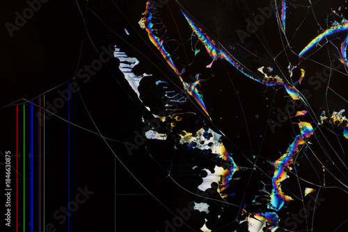 Abstract digital breakdown: flowing crystal-like stripes and cracks in vivid colors across a shattered LCD screen surface.