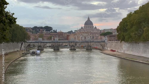 The river Tiber, the Angels Bridge and Basilika Saint Peter in Rome, Italy