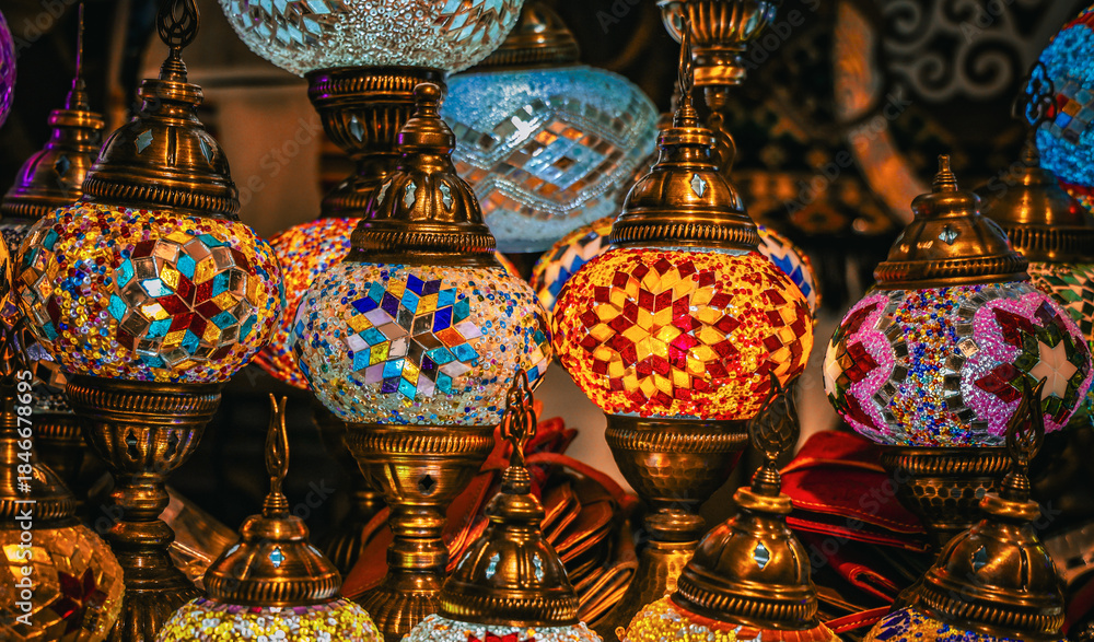 Fototapeta premium Colorful Turkish Mosaic Lanterns Glowing in Market Display