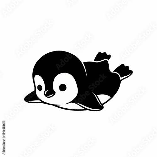 Adorable Baby Penguin Lying Down on its Belly.