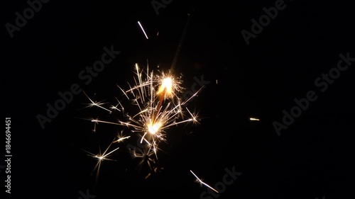Wallpaper Mural New Year sparklers glowing in darkness. Glowing sparklers on black background. Bright sparklers glowing on black background Torontodigital.ca