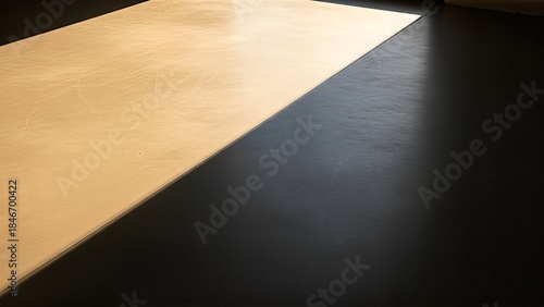 Black and Beige Flooring with Sunlight Shadow.