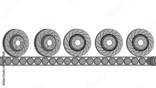 Automotive brake rotors are shown moving along a conveyor belt in a manufacturing or industrial setting.