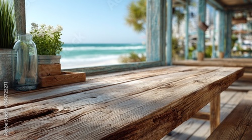 Fototapeta Naklejka Na Ścianę i Meble -  A wooden table with a vase of flowers and a potted plant on it