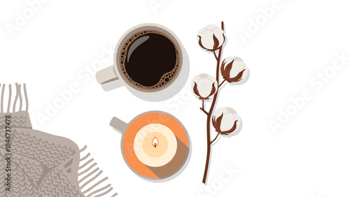 Cozy autumn flat lay featuring a warm beverage, a lit candle, and a cotton branch evoking feelings of comfort and relaxation.