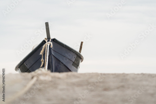 vacation mood with small boat on shoreline
