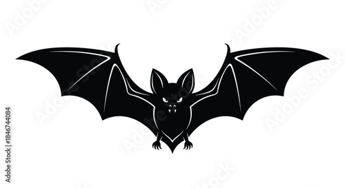 Spooky black silhouette of a vampire bat with spread wings, sharp fangs, and glowing eyes, perfect for Halloween decorations.