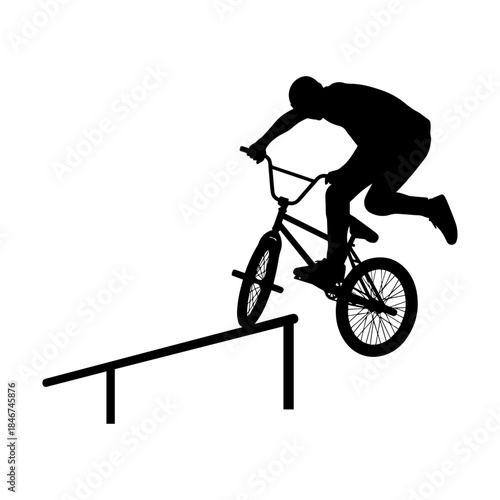 BMX Rider Performing Extreme Trick on Metal Rail Silhouette.
