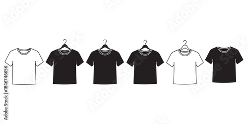 Collection of blank black and white t shirts on hangers in a row